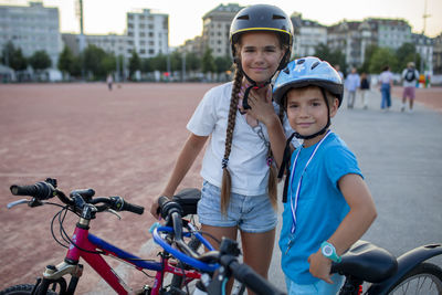 Portrait of boy riding bicycles on street