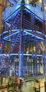 Low angle view of modern building at night