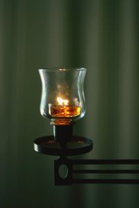 Close-up of tea light candle on table