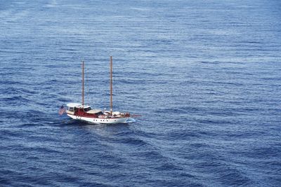 High angle view of sailboat sailing on sea