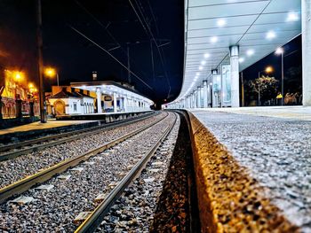 Surface level of railroad tracks at night