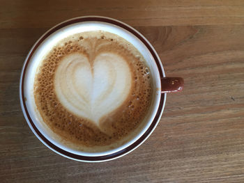 Close-up of coffee cup on table