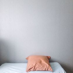Close-up of man sleeping on bed