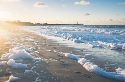 Scenic view of frozen sea against sky