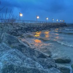 Scenic view of sea at night