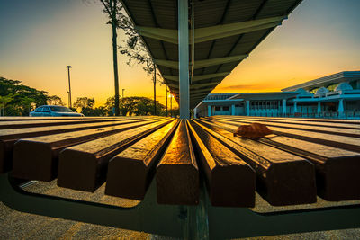 View of railroad tracks against sky during sunset