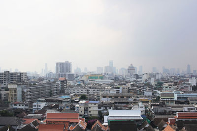 Cityscape against clear sky