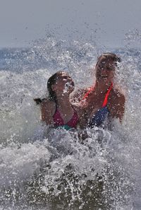 People enjoying in sea water