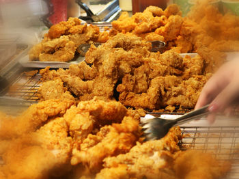 Close-up of hand holding food