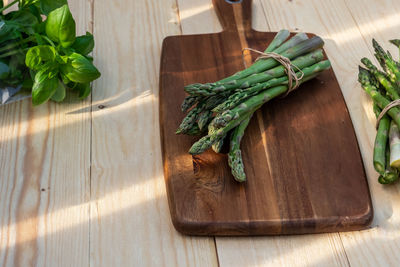 High angle view of vegetables on cutting board