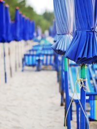 Row of chairs on beach