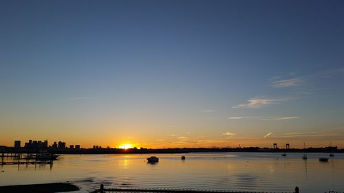 Scenic view of sunset over river