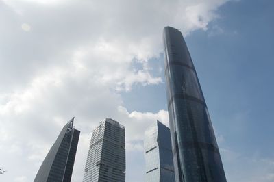 Low angle view of modern buildings against sky