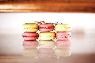 Close-up of macaroons with rings on table