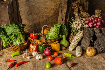 Still life vegetables, herbs and fruits as ingredients in cooking.