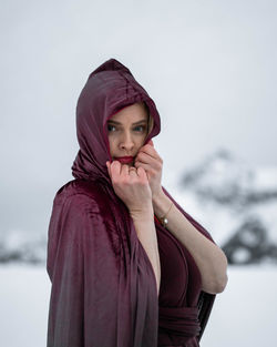 Portrait of young woman during winter