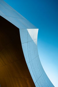 Low angle view of building against blue sky