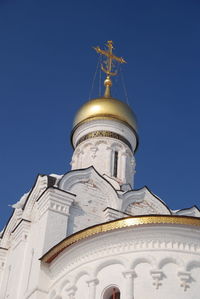 Low angle view of building against blue sky