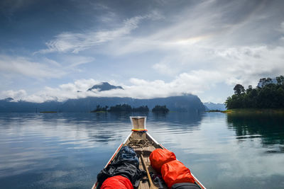 Boat on lake against sky