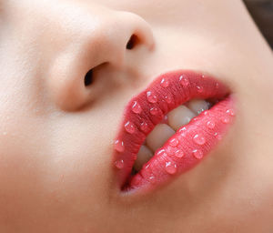 Cropped image of woman with wet lips