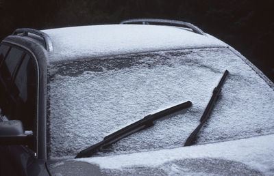 High angle view of snow covered car