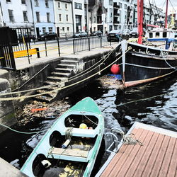 High angle view of boats moored in canal