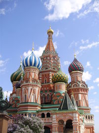 Low angle view of cathedral against cloudy sky