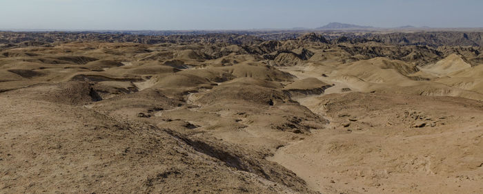 Scenic view of desert against sky