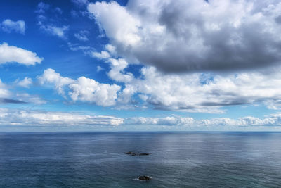 Rock formations and clouds viewed from gyeongpo beach in gangneung, south korea.