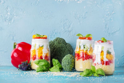 Couscous in jars with vegetables