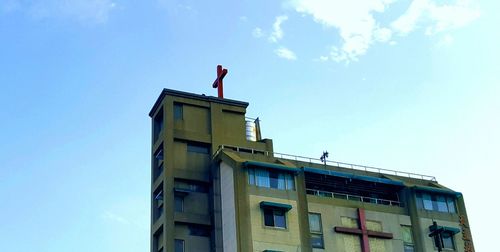 Low angle view of residential building against sky