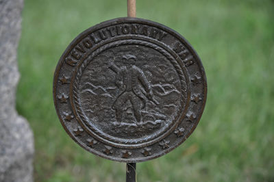 Close-up of coin against black background