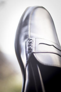 Close-up of shoes on table