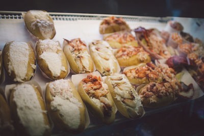 Close-up of hot dogs for sale in store