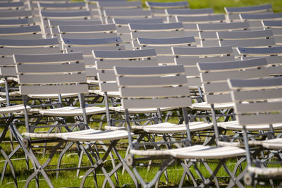 High angle view of chairs on table