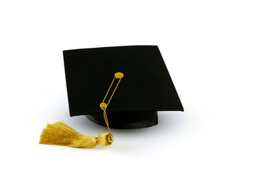 High angle view of pen on book against white background