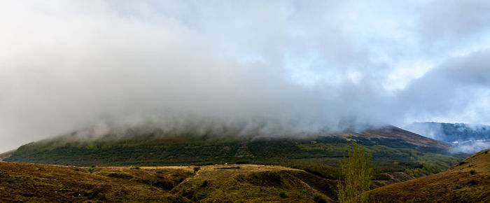 Panoramic view of volcanic landscape against sky