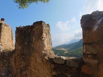 Panoramic view of rocky mountains against sky