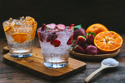 Close-up of orange juice on table