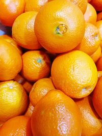 Close-up of oranges for sale at market stall