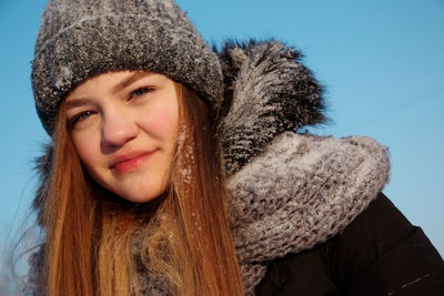 Portrait of cute smiling girl in winter