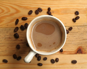 High angle view of coffee cup on table