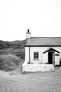 White cottage in rugged landscape