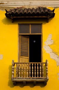 Close-up of yellow building