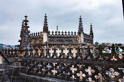 Exterior of temple building against sky