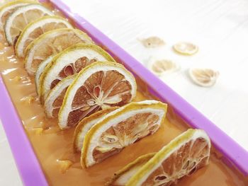 Close-up of fruit in plate on table