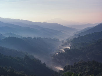 Scenic view of mountains against sky during sunset