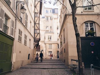 Narrow alley along buildings