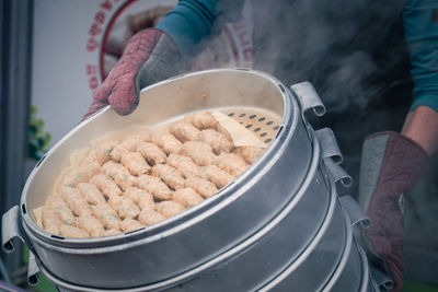 Close-up of person preparing food