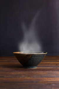 Close-up of bread in bowl on table